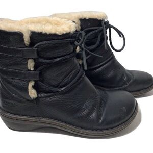 Ugg black leather fur lined tie around winter boots. Size 8.